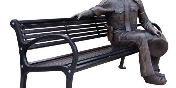 Nathan-Scott-Police-Officer-Scuplture-on-Wishbone-All-Metal-Mountain-Classic-Bench-in-Lacomb-Alberta